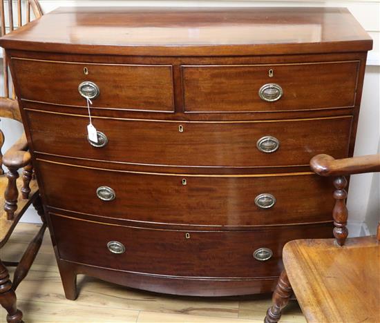 A Regency mahogany bowfronted chest with crossbanded top W.101cm